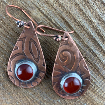 Antiqued and etched copper teardrop dangle earrings with a carnelian gemstone setting on French earwire.